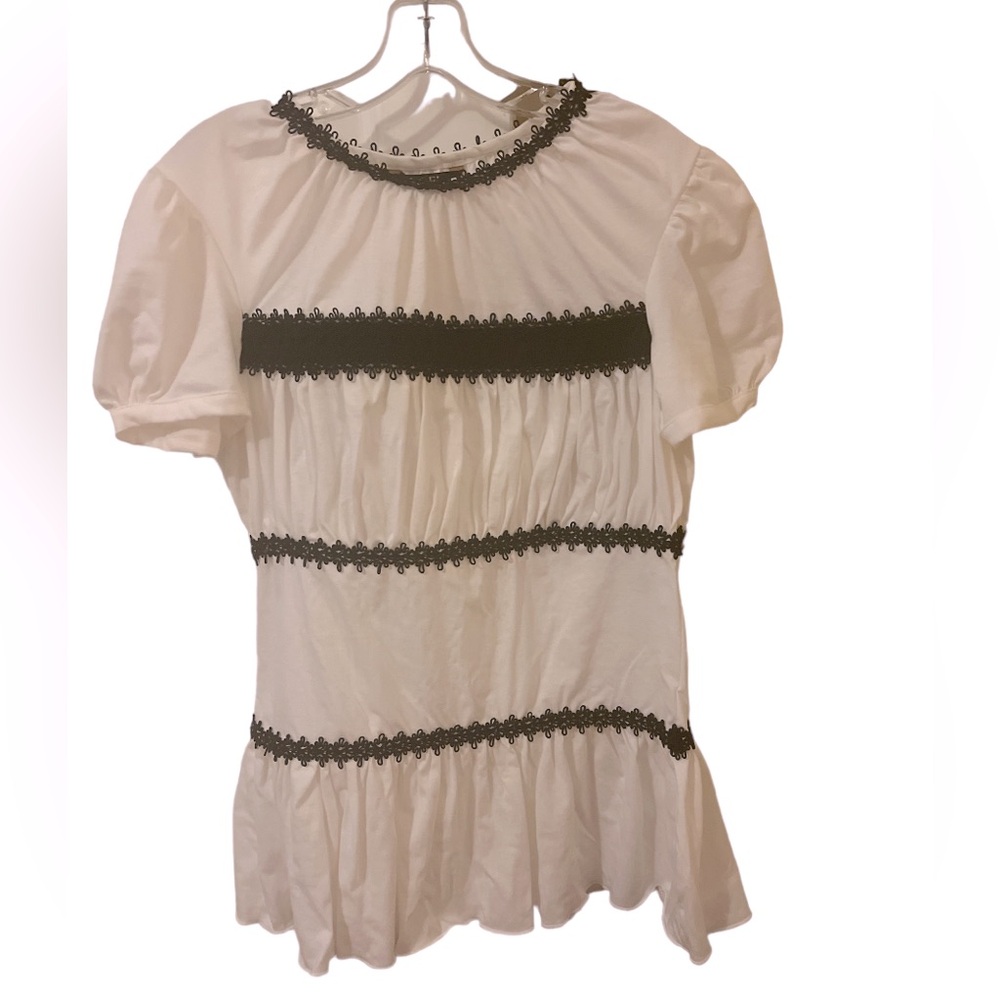 KOEL size large black and white top. 100% cotton rayon and polyester. 27” long